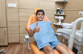 Happy child patient at Root Care Dental Clinic pediatric dentist, Sector 49 Gurugram