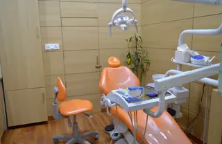 Modern dental treatment room at Root Care Dental Clinic, Gurugram